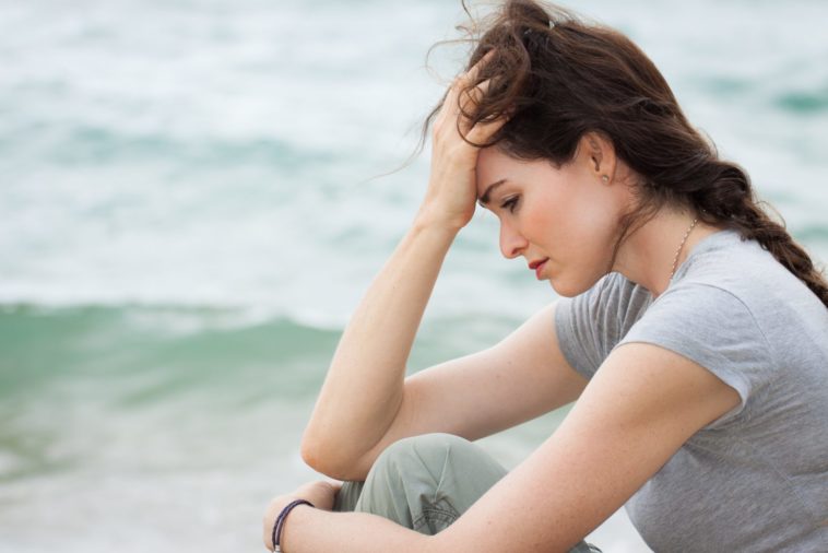 Close-Up Of A Sad And Depressed Woman