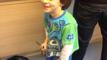 kid holding knife
