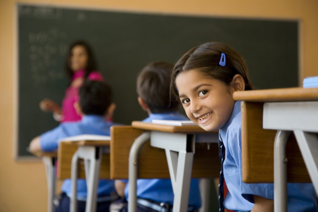 School Girl In The Classroom